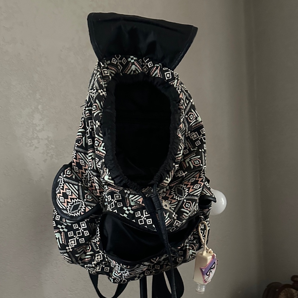 Patterned Backpack With Black And White Accents - image 4